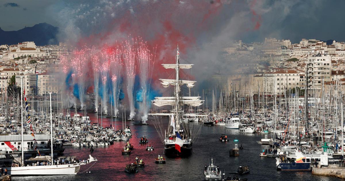 Historic ship delivers Olympic flame to France for the Summer Games